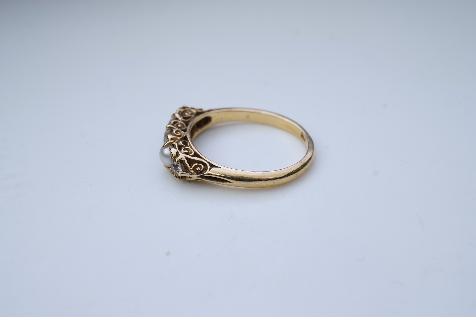 A five-stone pearl and diamond ring, early 20th century